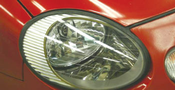 Newly restored headlights on a early-2000s Ford vehicle