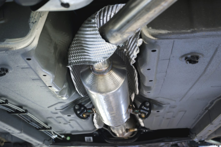 Undercar view of catalytic converter and corrugated heatshield