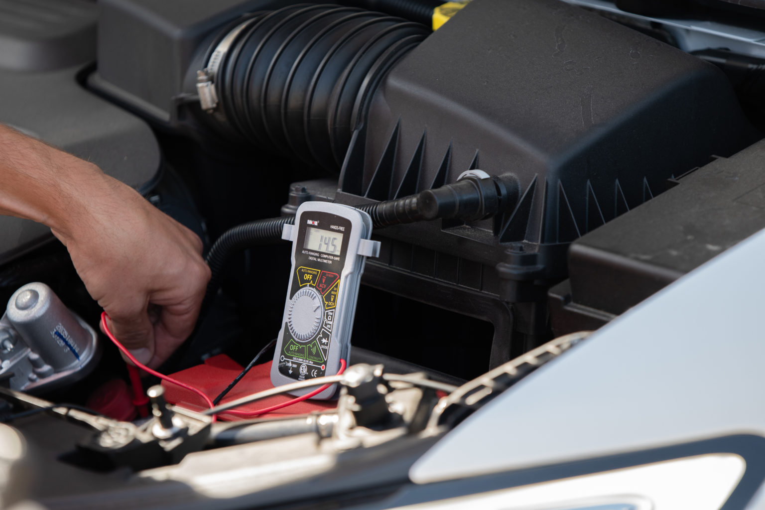 How To Test A Car Battery S Voltage With A Multimeter AutoZone   Multimeter Being Used To Test Battery 1 1536x1024 